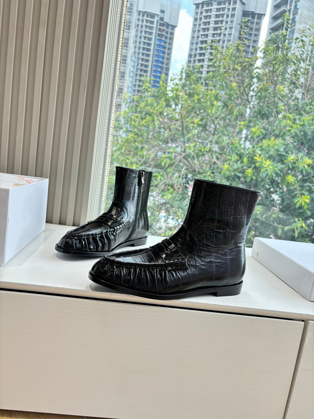YSL 25S ANKLE FLAT BOOTS IN BLACK EMBOSSED LAMBSKIN WITH SIDE ZIPPER