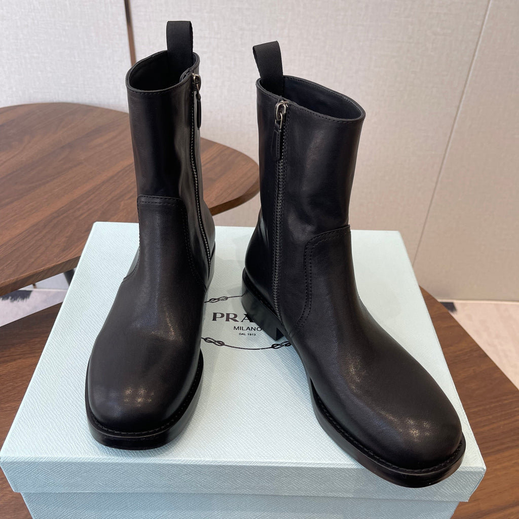 PRADA 25S COWBOY BOOTS IN RK BLACK-BROWN CALFSKIN