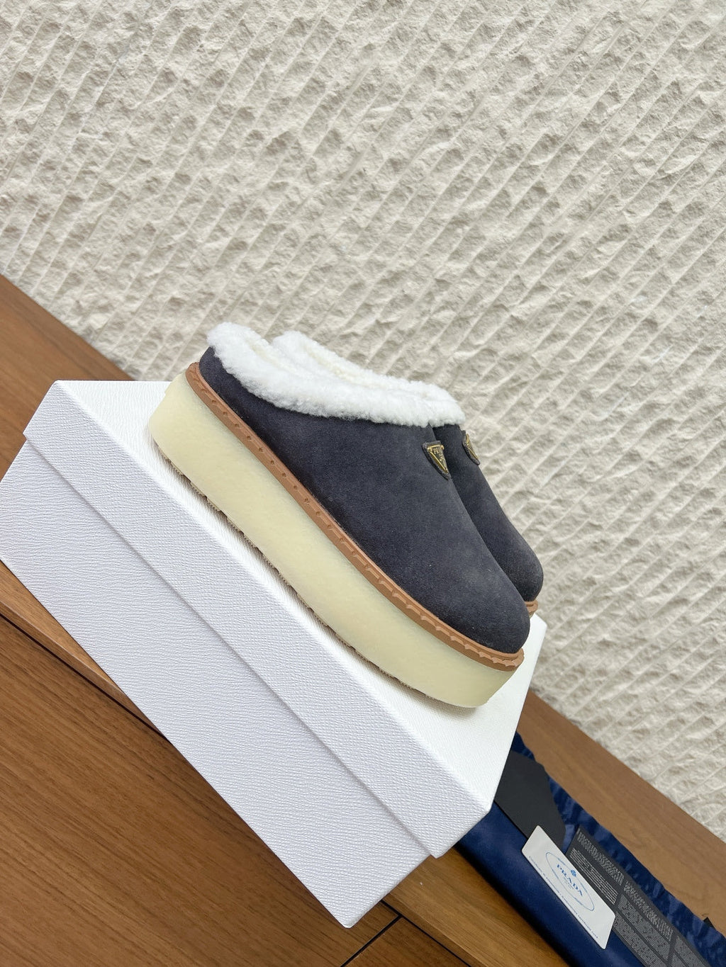 PRADA 25S PLATFORM FUR-LINED MULES IN RK GREY SUEDE
