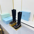 PRADA 25S HIGH BOOTS MARTIN 50MM IN BLACK GLOSSY CALFSKIN WITH LOGO