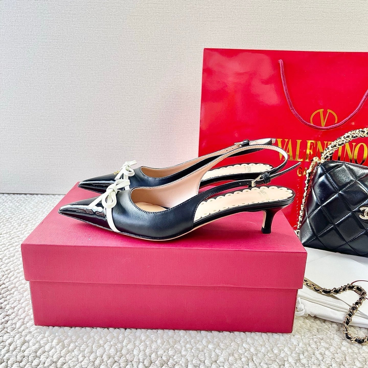 VLTN HIGH SLINGBACK 25S 40 MM IN BLACK LAMBSKIN WITH BOW