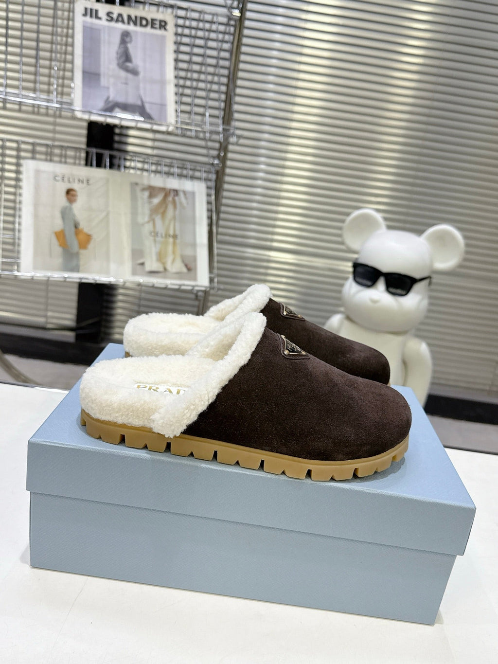 PRADA 25S FUR-LINED MULES IN RK BROWN SUEDE