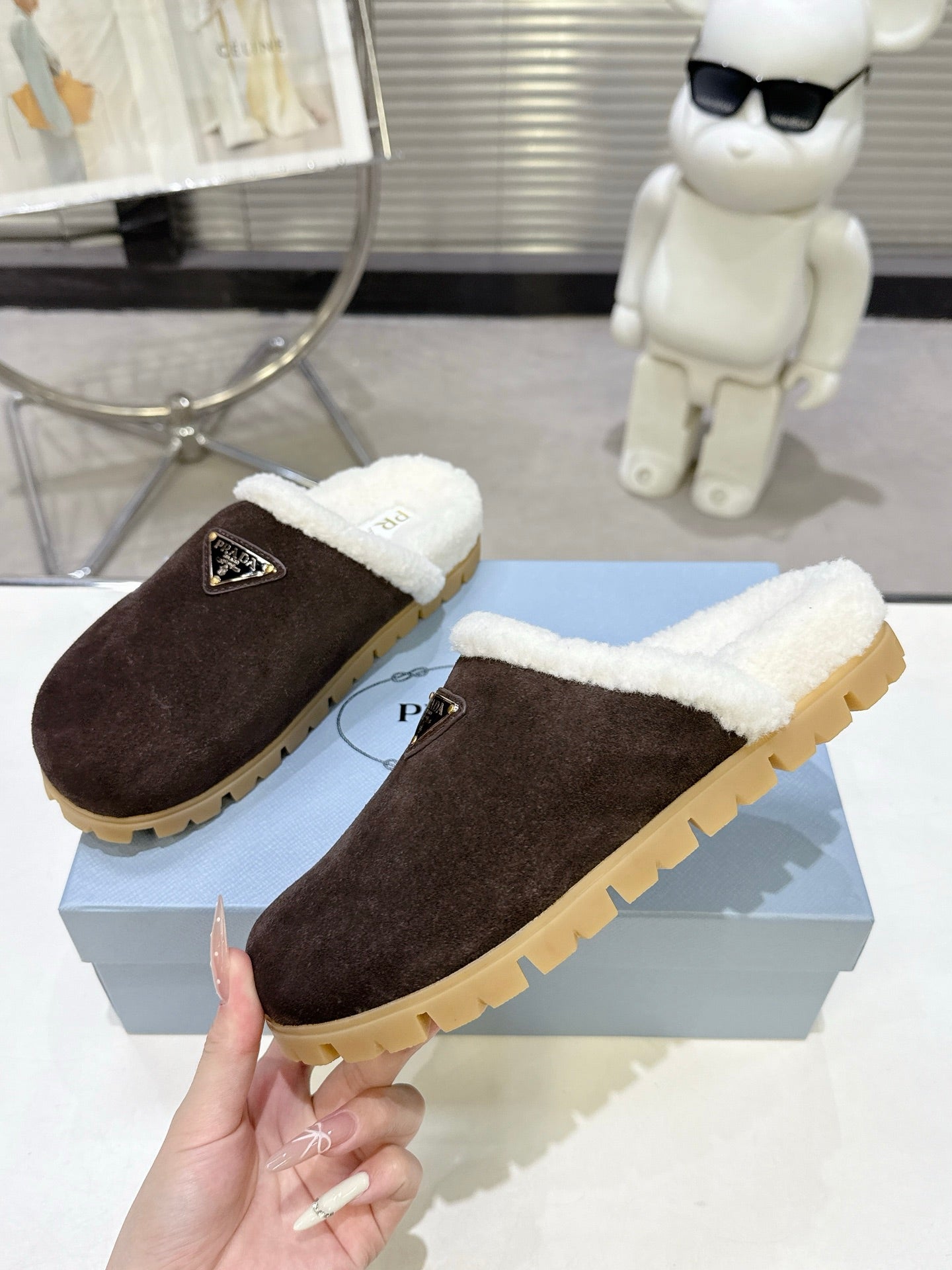 PRADA 25S FUR-LINED MULES IN RK BROWN SUEDE