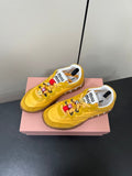 TYRE SNEAKERS IN YELLOW TECHNICAL FABRIC AND SUEDE WITH STICKER