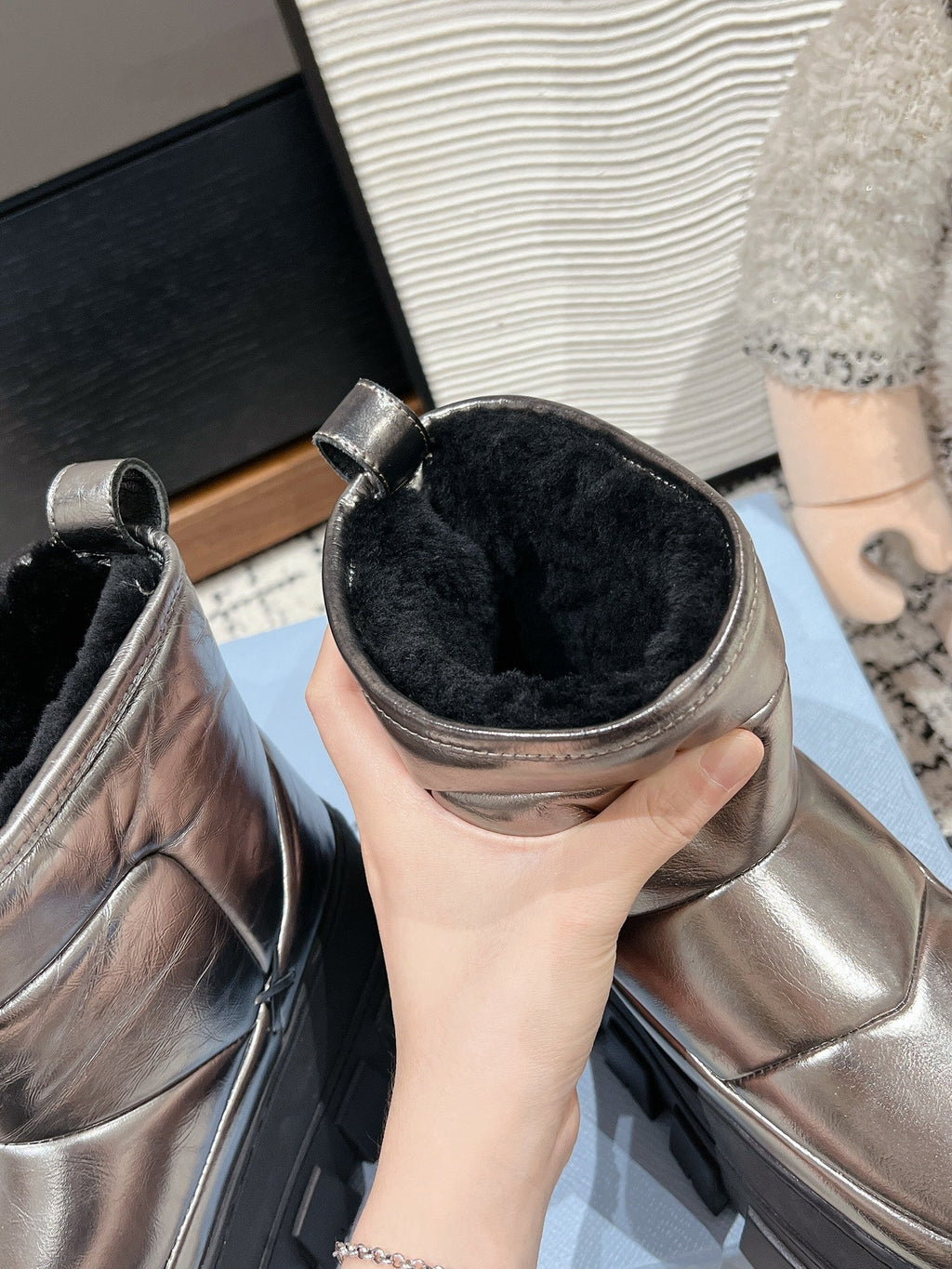 PRADA MONOLITH ANKLE BOOTS IN METALLIC GRAY CALFSKIN AND LAMB FUR LINING