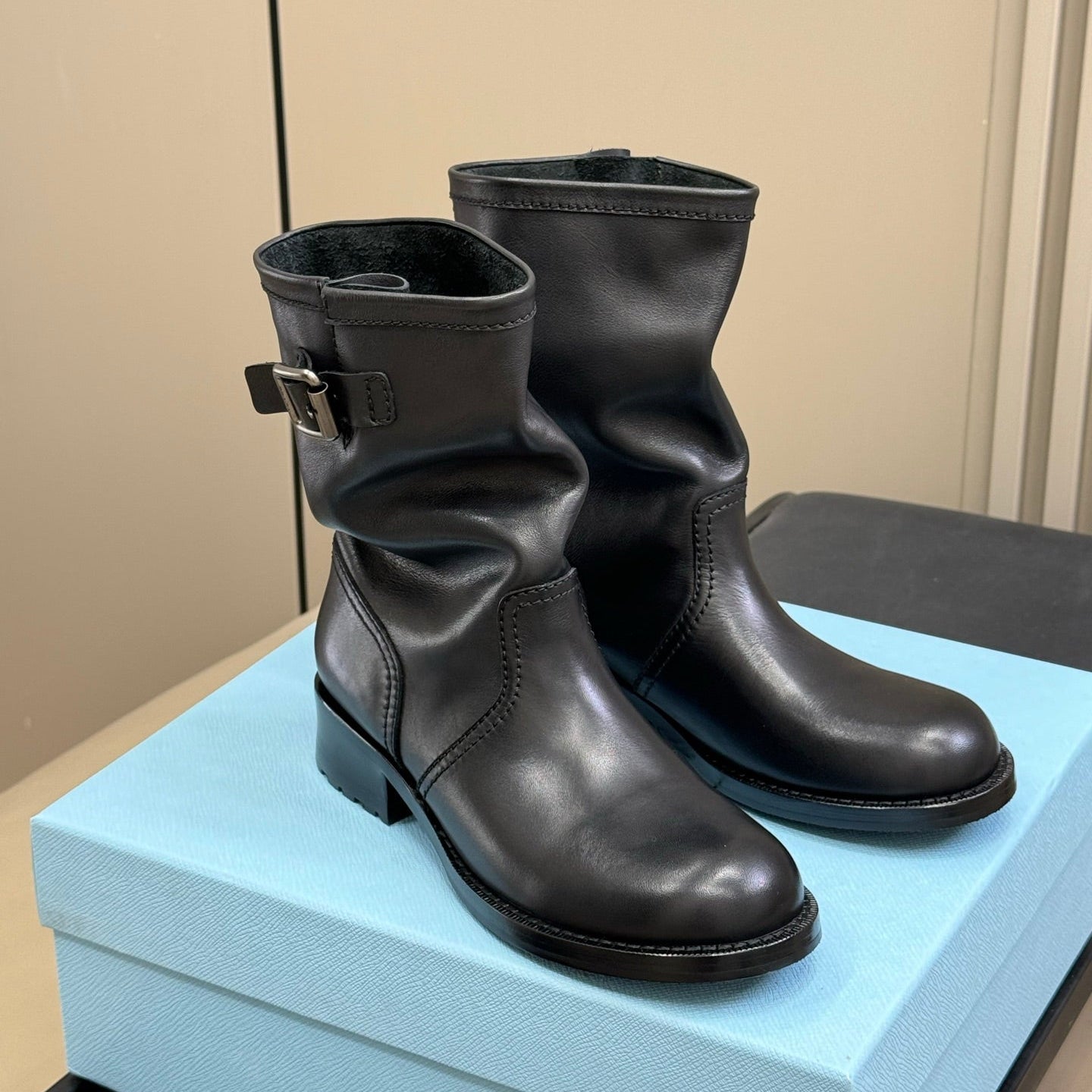 PRADA 25S ANKLE BOOTS IN RK BLACK BROWN CALFSKIN