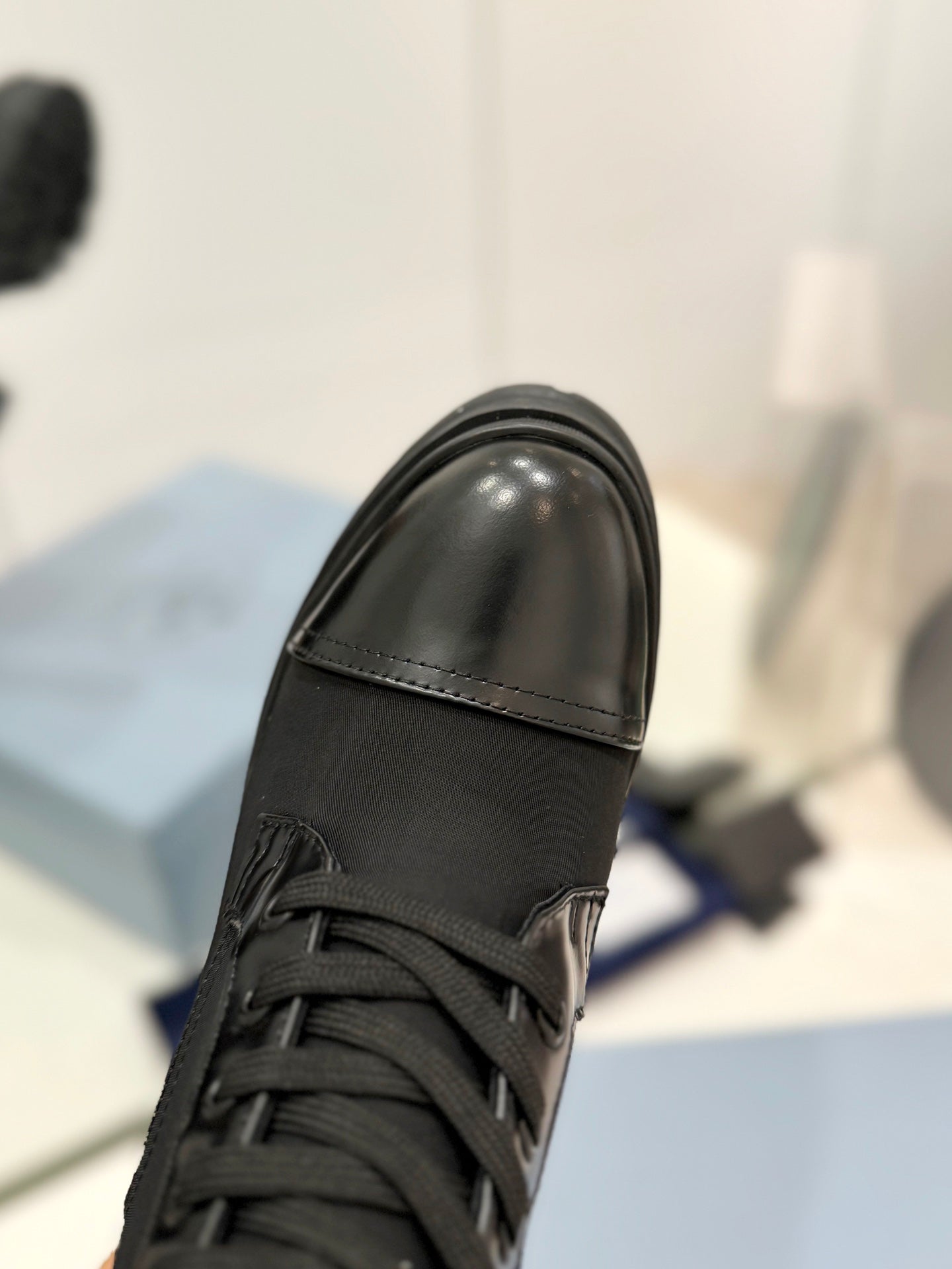 PRADA BRUSHED LEATHER AND RE-NYLON LACED BOOTIES BLACK